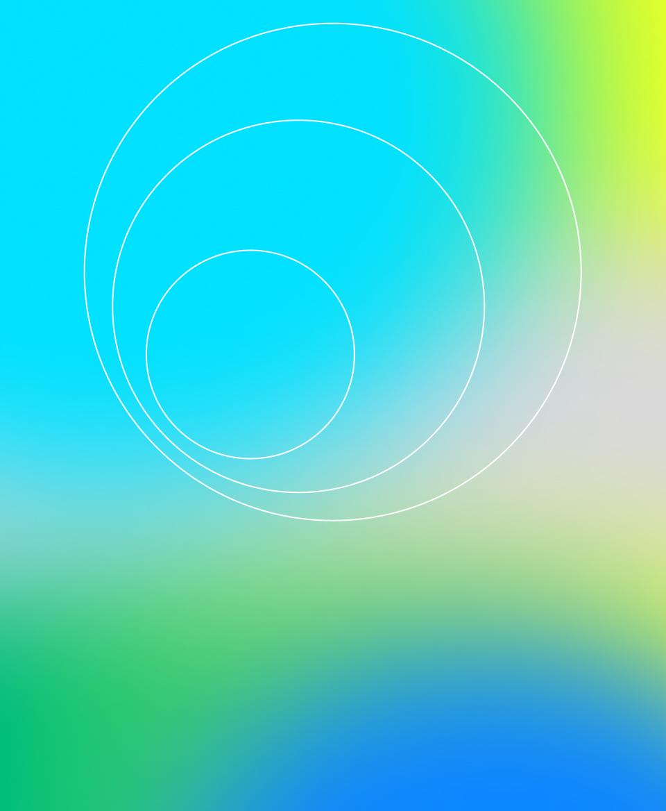 Three white circles on a rainbow gradient.