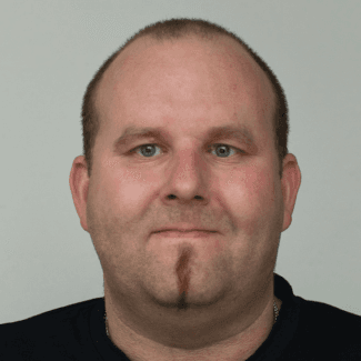 A professional headshot of Georg Wellschmied.