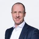A professional headshot of COO Andreas Pletscher.
